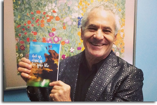 Dr Gary with his book